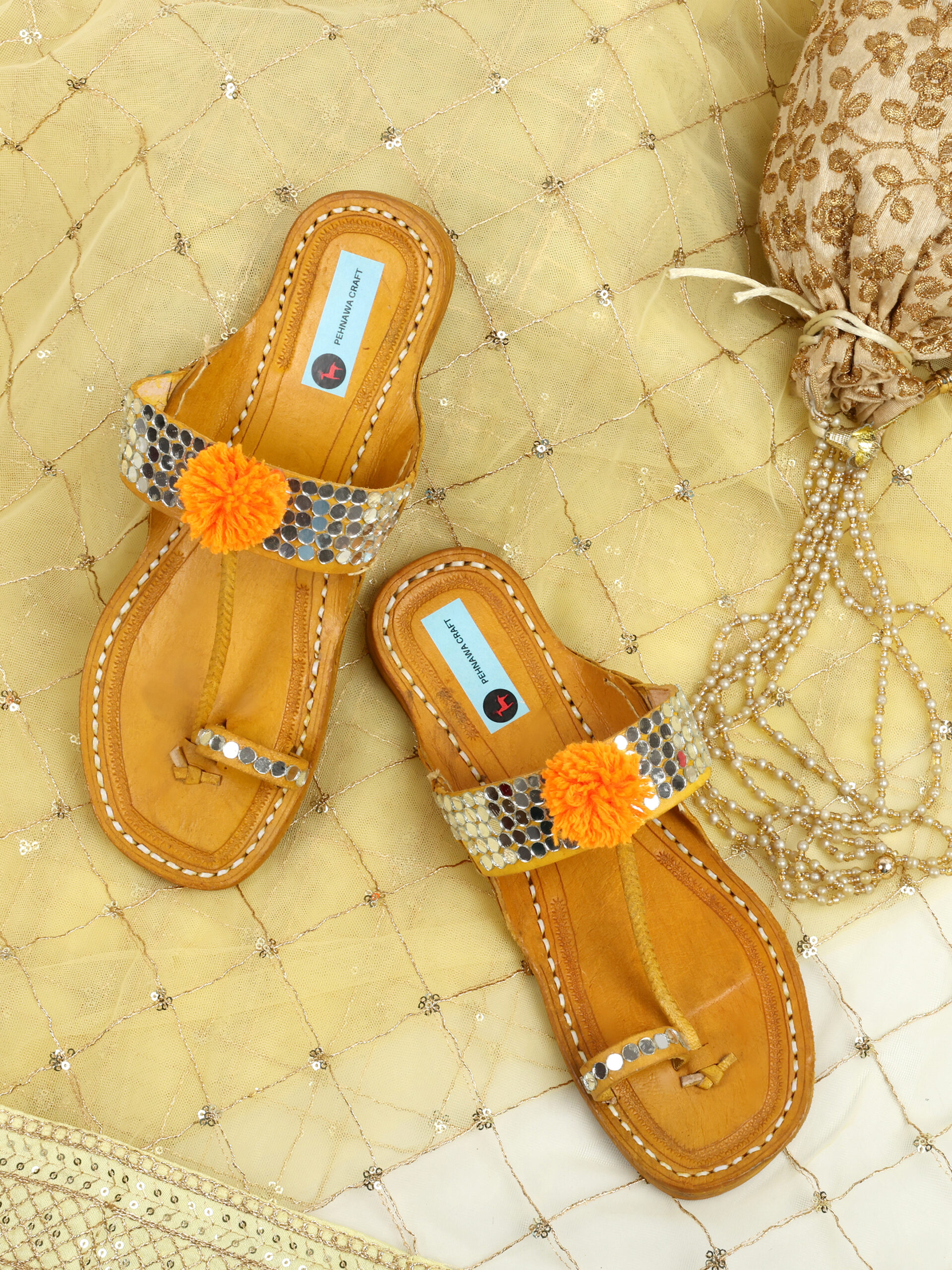 PehnawaCraft orange pompom kolhapuri | orange flats